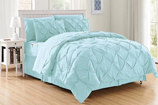 Lifestyle image of the 8-piece bed-in-a-bag set in the color aqua