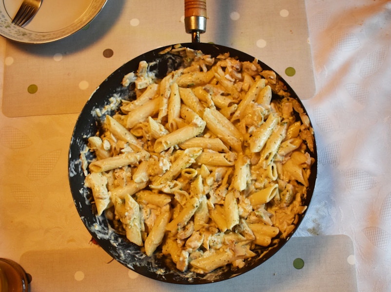 Pasta in a pan on the dinner table