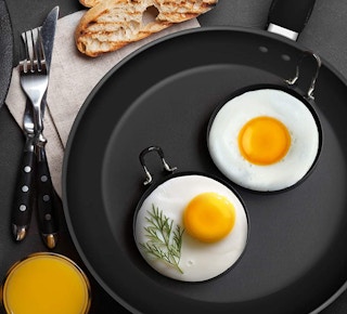 egg cooking rings in a skillet