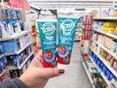 hand holding tom's of maine kids toothpaste