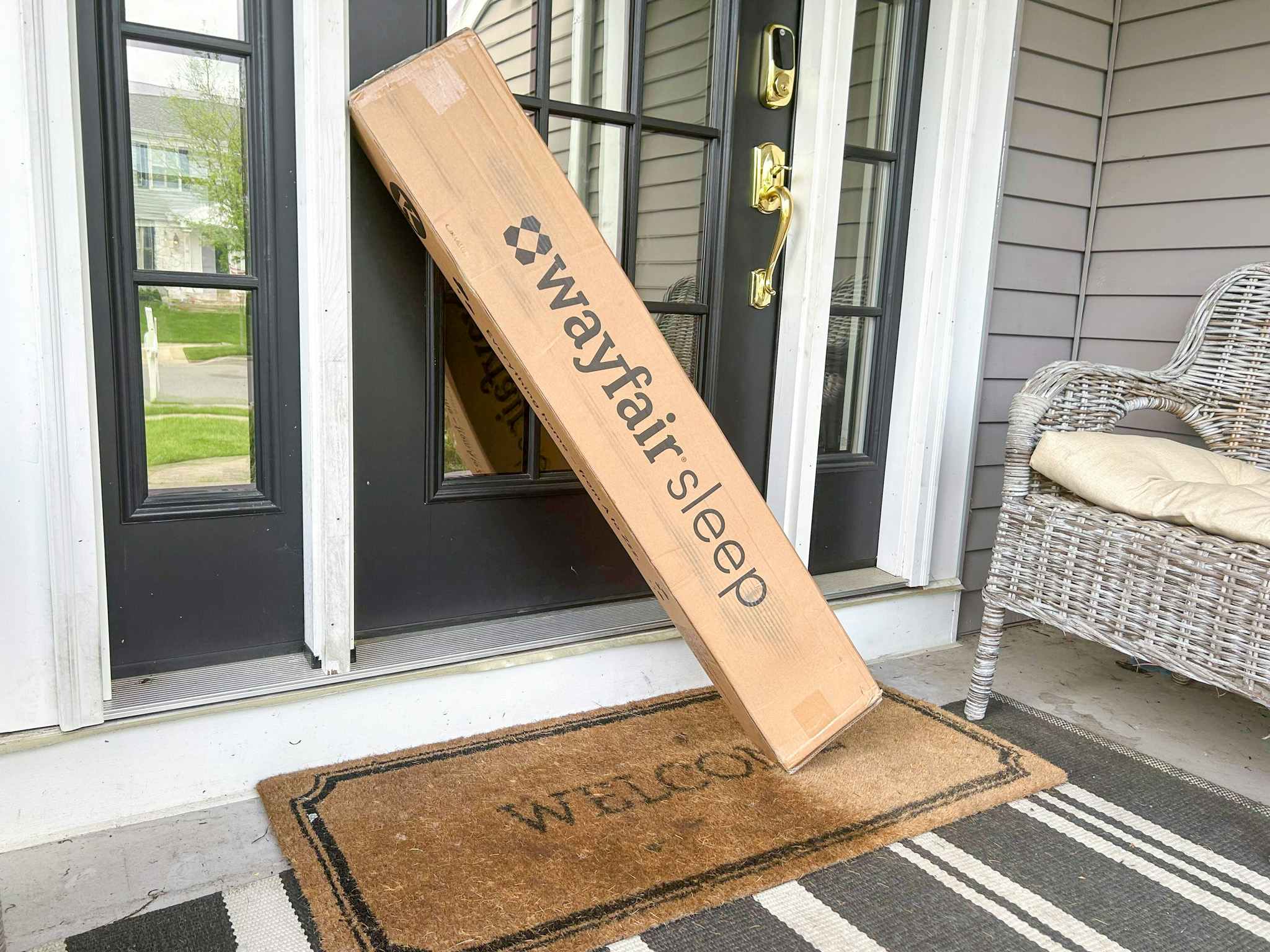 Long wayfair box at a doorstep