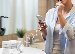 This Water Dental Flosser Is Only $9.99 on Amazon card image