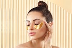 Woman wearing under-eye patches.