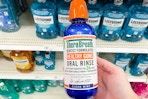 a bottle of clean mint therabreath mouthwash