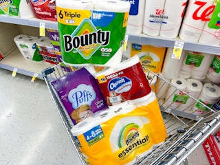 charmin, bounty, and puffs products in a cart