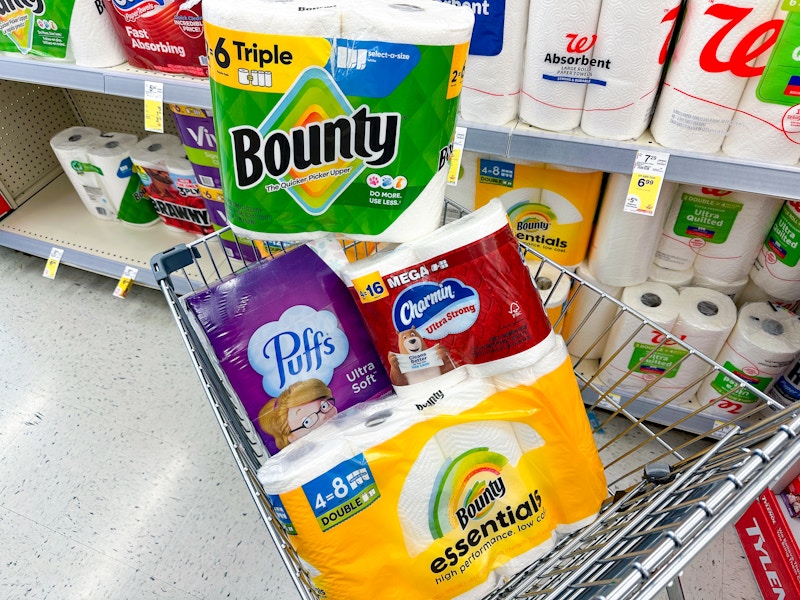 charmin, bounty, and puffs products in a cart