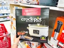 Crock-Pot Sous Vide in box being pulled of shelf at Target