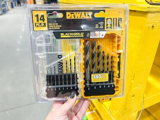Hand holding up 14-Piece Dewalt Drill Bit Set
