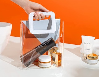 black water flosser in a clear bag with products