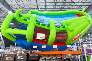 costco crocodile water slide park display in store