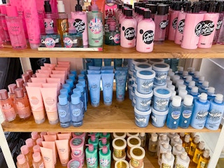 a display of body care items on shelfs