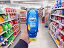 hand holding dawn dish soap in walgreens