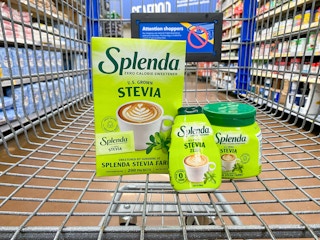 three containers of splenda stevia sweetener in walmart cart