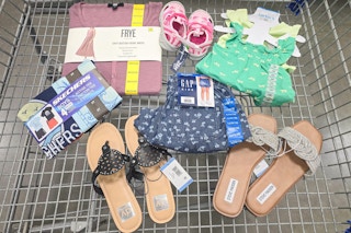 clothing and shoes for the family in a cart