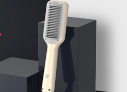 a beige hair straightening brush
