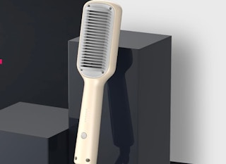 a beige hair straightening brush