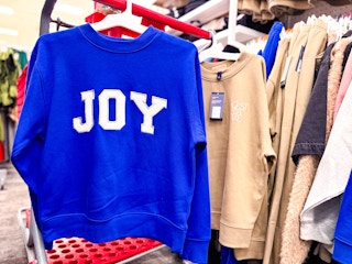 universal thread women's sweatshirts sitting on a target cart