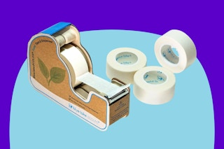 Masking Tape Dispenser with 4 Rolls on a blue background