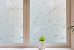 Lifestyle image of floral window privacy film installed on window in home