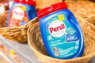 32-count of Persil Laundry Detergent Pacs in a natural basket at Walmart