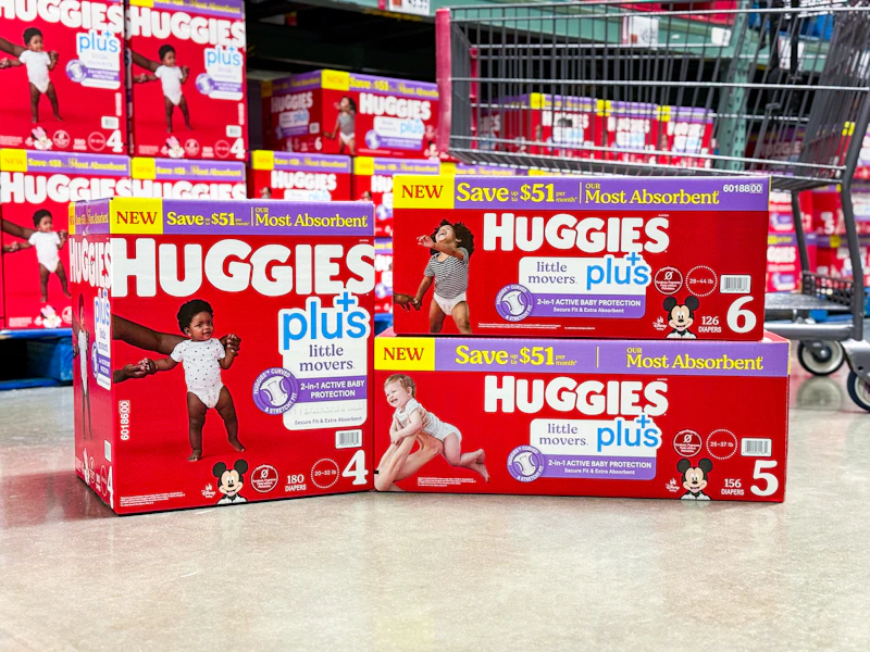 huggies diapers in front of cart in store floor