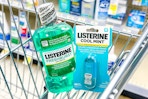 listerine mouthwash and breath spray in a cart