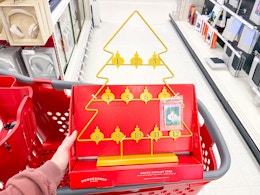 hand holding a wondershop instax photo advent calendar