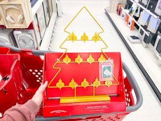 hand holding a wondershop instax photo advent calendar