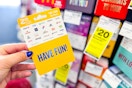 person holding a gift card
