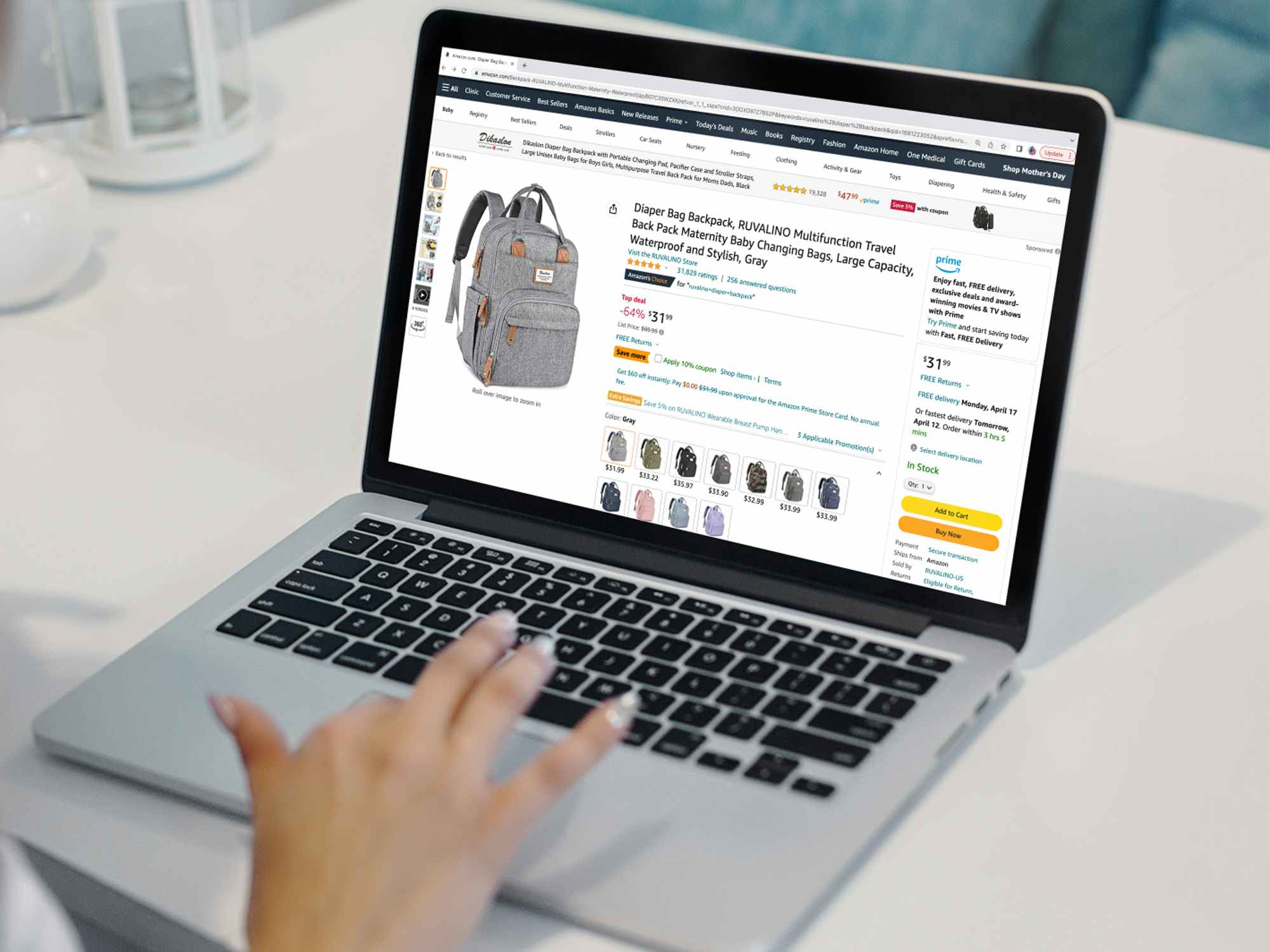 a person looking at a diaper bag on the amazon website