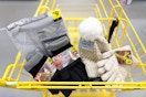 cold weather accessorits in yellow shopping cart