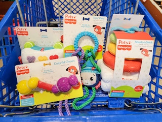 fisher price dog toys in a cart