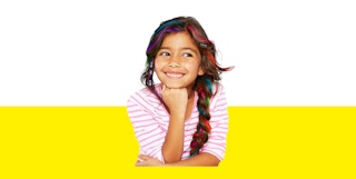 Barbie colorful hair in a little girl's hair