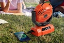 camping fan sitting on grass