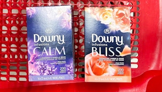 downy calm and bliss dryer sheets in a red basket