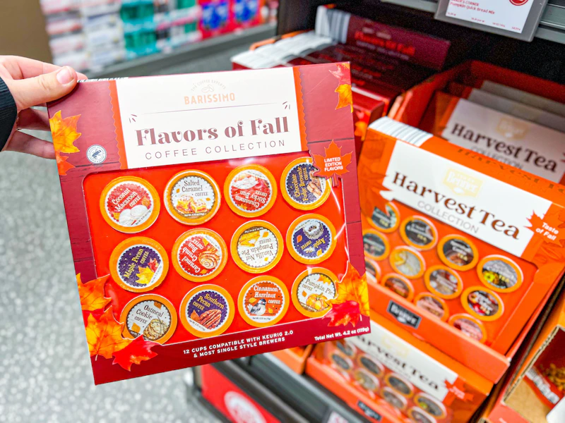 hand holding a pack of aldi fall kcups
