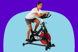 Man riding the Sunny Health & Fitness Stationary Exercise Bike.