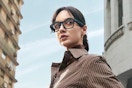 a woman wearing smart glasses