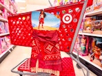 disney moana 2 adventure outfit hanging on a target cart