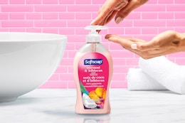 hand pumping hand soap into palm