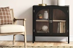 Lifestyle image of the black Threshold Accent Cabinet in home setting