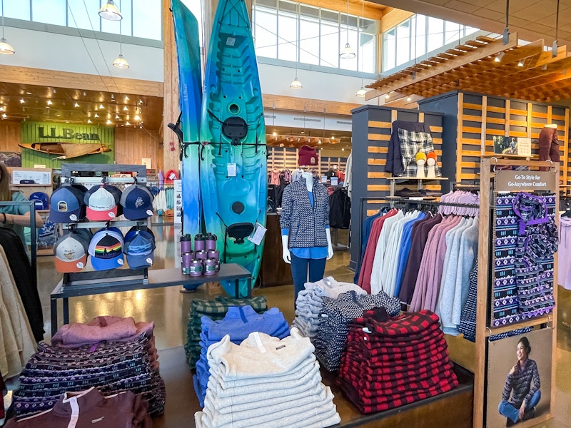 The inside of an L.L.Bean store showing products on display.