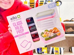 woman holding ello glass meal prep box in target aisle