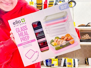 woman holding ello glass meal prep box in target aisle