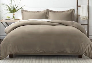 king-size taupe duvet set sitting on a bed