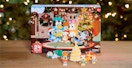 A Bluey advent calendar on a table in front of a Christmas tree
