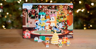A Bluey advent calendar on a table in front of a Christmas tree