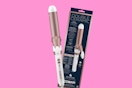 a rose gold and white curling iron next to its packaging 