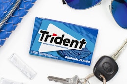 a pack of gum next to keys