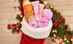 5 Ulta products in Christmas stocking (lifestyle image/close up shot)